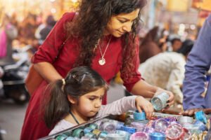 mother and daughter shopping at bazaar